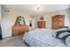 Spacious main bedroom with plush carpeting and natural light at 504 Branding Iron Ct, Brighton, CO 80601
