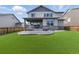 Home features a spacious manicured lawn and stamped concrete patio, perfect for outdoor entertaining at 690 Avena Dr, Elizabeth, CO 80107