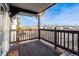 Spacious balcony with wooden deck and scenic views at 17361 E Mansfield Ave # 531R, Aurora, CO 80013