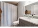 Clean bathroom, shower/tub combo, vanity with countertop sink at 17361 E Mansfield Ave # 531R, Aurora, CO 80013