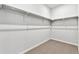 Walk-in closet with carpeted floors and adjustable shelving at 2548 Wesley Ln, Lafayette, CO 80026