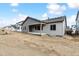 Back of new construction home featuring a covered patio at 2548 Wesley Ln, Lafayette, CO 80026