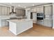 Modern kitchen with stainless steel appliances and a large island at 2548 Wesley Ln, Lafayette, CO 80026