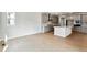 Open kitchen with stainless appliances and island at 2548 Wesley Ln, Lafayette, CO 80026