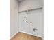 Laundry room features tile floors and shelving at 2548 Wesley Ln, Lafayette, CO 80026