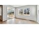Bright living room featuring hardwood floors, and sliding glass doors at 2548 Wesley Ln, Lafayette, CO 80026