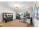 Bright office featuring hardwood floors, built in shelves, and a sun-filled window at 4600 E 3Rd Ave, Denver, CO 80220