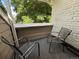 Cozy balcony with two chairs, offering a spot to relax and enjoy the outdoors at 12478 W Nevada Pl # 207, Lakewood, CO 80228