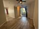 Bedroom featuring a fan and sliding glass doors to an outdoor patio at 12478 W Nevada Pl # 207, Lakewood, CO 80228