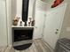 Fireplace with unique black and white tile and mantle at 12478 W Nevada Pl # 207, Lakewood, CO 80228