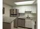 Modern kitchen with stainless steel appliances and granite countertops at 12478 W Nevada Pl # 207, Lakewood, CO 80228