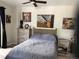 Well-lit main bedroom with neutral walls, a ceiling fan, and stylish decor at 12478 W Nevada Pl # 207, Lakewood, CO 80228