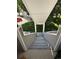 Exterior staircase providing access to upper-level condos, featuring sturdy construction at 12478 W Nevada Pl # 207, Lakewood, CO 80228