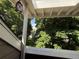 Beautiful outdoor view from the balcony featuring lush greenery and a neighboring building at 12478 W Nevada Pl # 207, Lakewood, CO 80228