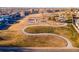 Aerial view of community park with playground and walking paths at 2269 Coronado Pkwy # C, Denver, CO 80229