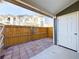 Private back patio has a brick surface and a wooden fence surrounding it at 2269 Coronado Pkwy # C, Denver, CO 80229