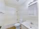 Well-lit bathroom with a shower over tub, white cabinets, and a modern faucet at 2269 Coronado Pkwy # C, Denver, CO 80229