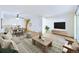 Cozy living room and dining area with hardwood floors, white walls, and ceiling fan at 2269 Coronado Pkwy # C, Denver, CO 80229