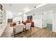 Basement living area with stylish decor and updated flooring at 2660 Julian St, Denver, CO 80211