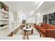 Spacious basement featuring stylish seating and built-in shelving at 2660 Julian St, Denver, CO 80211