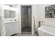 Stylish bathroom featuring a modern vanity and frameless glass shower at 2660 Julian St, Denver, CO 80211