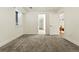 Bedroom with neutral carpet flooring, and a bright interior at 2660 Julian St, Denver, CO 80211