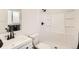 Clean bathroom with white vanity, shower, and toilet at 4501 S Lipan Ct, Englewood, CO 80110