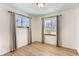 Charming bedroom featuring hardwood floors and two windows at 4501 S Lipan Ct, Englewood, CO 80110