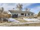 Newly remodeled home with a modern exterior and landscaping at 4501 S Lipan Ct, Englewood, CO 80110