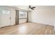 Bright living room with hardwood floors and a ceiling fan at 4501 S Lipan Ct, Englewood, CO 80110