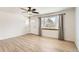 Spacious living area with hardwood floors and lots of natural light at 4501 S Lipan Ct, Englewood, CO 80110