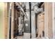 Basement mechanical room with furnace and water heater at 4501 S Lipan Ct, Englewood, CO 80110