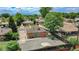 Aerial view of house, backyard and neighborhood at 7020 Avrum Dr, Denver, CO 80221
