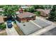 Brick ranch house with gravel driveway and small yard at 7020 Avrum Dr, Denver, CO 80221