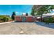 Large backyard with gravel landscaping and stepping stones at 7020 Avrum Dr, Denver, CO 80221