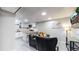 Comfortable basement apartment with a kitchenette and living area at 7020 Avrum Dr, Denver, CO 80221