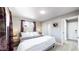 Spacious bedroom featuring a king-size bed and ample natural light at 7020 Avrum Dr, Denver, CO 80221