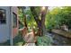 Backyard bridge and canal with mature trees, foliage, and a sunny view at 1633 18Th St # 2, Boulder, CO 80302