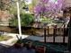 Backyard and canal featuring a bridge and mature trees at 1633 18Th St # 2, Boulder, CO 80302