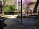 Backyard and canal featuring a charming deck with mature trees and landscaping at 1633 18Th St # 2, Boulder, CO 80302
