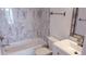 Bathroom with tiled tub, toilet, and vanity at 1633 18Th St # 2, Boulder, CO 80302