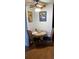 Cozy dining area with a round table, two chairs, and artwork at 1633 18Th St # 2, Boulder, CO 80302