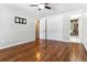 Bright bedroom with hardwood floors and an ensuite bathroom at 770 S Arbutus St, Lakewood, CO 80228