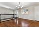 Bright dining room with hardwood floors and a view to the kitchen at 770 S Arbutus St, Lakewood, CO 80228