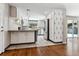 Modern kitchen with white cabinets and granite countertops at 770 S Arbutus St, Lakewood, CO 80228