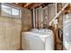 Basement laundry room with washer and dryer hookups at 770 S Arbutus St, Lakewood, CO 80228