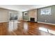 Bright living room with hardwood floors and sliding doors at 770 S Arbutus St, Lakewood, CO 80228