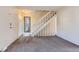 Bright entryway featuring durable floors, a staircase, and natural light at 3706 S Fairplay Way, Aurora, CO 80014