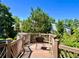 Inviting deck space with views of the surrounding greenery and neighborhood at 9466 Morning Glory Ln, Highlands Ranch, CO 80130