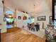 Elegant dining room featuring hardwood floors, a chandelier, and an open layout at 9466 Morning Glory Ln, Highlands Ranch, CO 80130